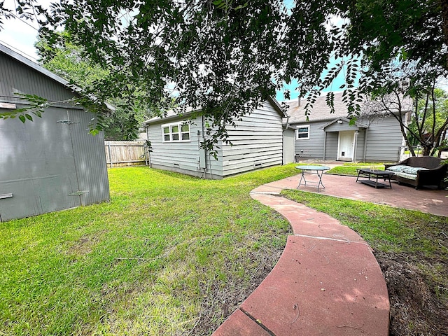 1325 W Chestnut St, Denison, TX 75020 - view of yard featuring a patio area, an outdoor hangout area, and an outdoor structure