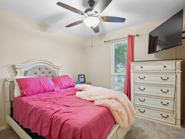 2012 Mobile Dr, Ennis, TX 75119 - carpeted bedroom featuring a ceiling fan