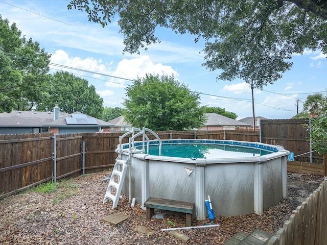 2012 Mobile Dr, Ennis, TX 75119 - view of swimming pool featuring a fenced backyard