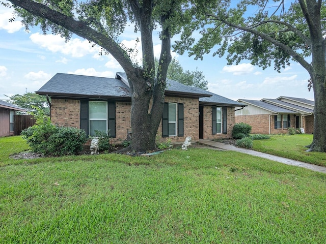 2012 Mobile Dr, Ennis, TX 75119 - single story home featuring brick siding and a shingled roof