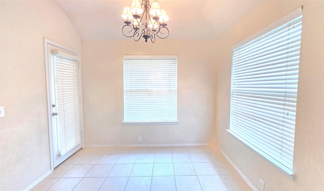 4012 Glenwyck Dr E, North Richland Hills, TX 76180 - spare room with a chandelier, light tile patterned floors, and lofted ceiling
