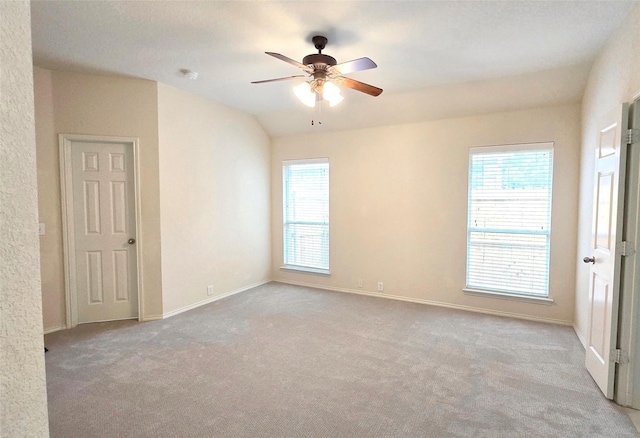 4012 Glenwyck Dr E, North Richland Hills, TX 76180 - carpeted empty room with healthy amount of natural light, ceiling fan, a smoke detector, and vaulted ceiling