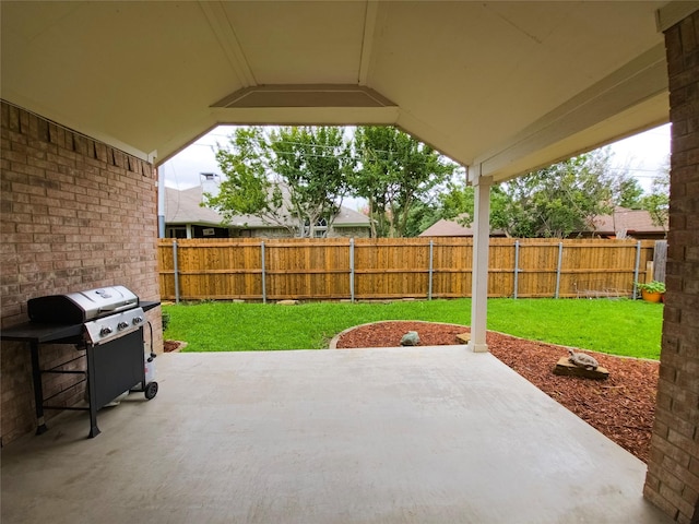 4012 Glenwyck Dr E, North Richland Hills, TX 76180 - fenced backyard with a patio and grilling area
