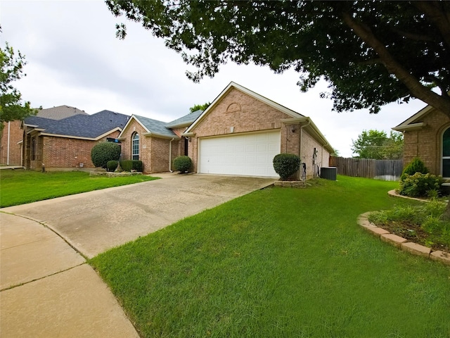 4012 Glenwyck Dr E, North Richland Hills, TX 76180 - view of front of house featuring brick siding, concrete driveway, and an attached garage