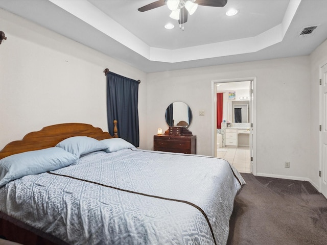 239 Valek Rd, Ennis, TX 75119 - bedroom featuring carpet flooring, a tray ceiling, recessed lighting, a ceiling fan, and ensuite bath