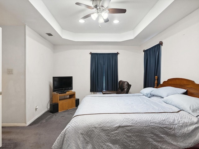239 Valek Rd, Ennis, TX 75119 - bedroom featuring carpet flooring, a tray ceiling, and a ceiling fan
