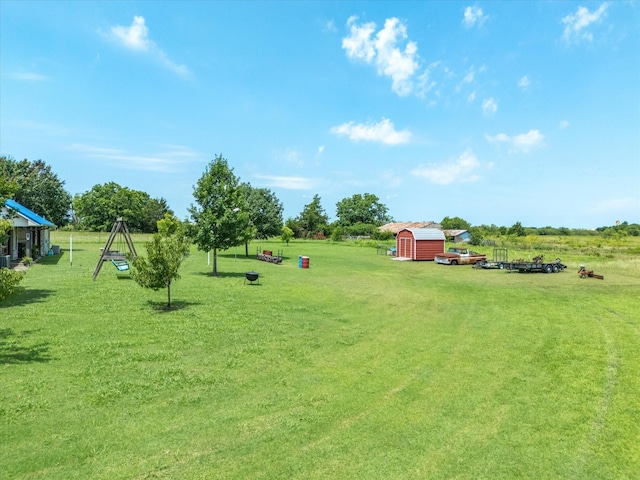 239 Valek Rd, Ennis, TX 75119 - view of grassy yard featuring a storage shed