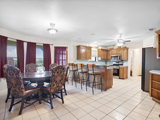 239 Valek Rd, Ennis, TX 75119 - dining space featuring light tile patterned flooring and a ceiling fan