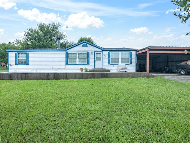 403 SE County Road 3048c, Corsicana, TX 75109 - manufactured / mobile home featuring a front lawn