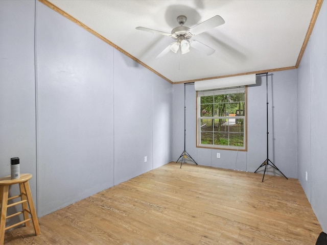 403 SE County Road 3048c, Corsicana, TX 75109 - unfurnished room featuring a ceiling fan, wood finished floors, and ornamental molding