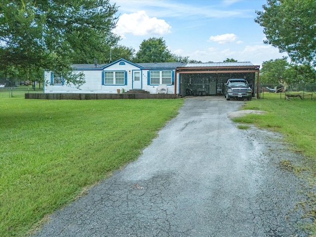 403 SE County Road 3048c, Corsicana, TX 75109 - view of front of home with asphalt driveway and a front lawn