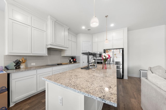 406 Garden Tree Trl, Midlothian, TX 76065 - kitchen featuring stainless steel appliances, decorative backsplash, white cabinets, dark wood-style flooring, and recessed lighting