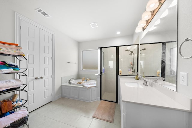 406 Garden Tree Trl, Midlothian, TX 76065 - full bath featuring vanity, a bath, a shower stall, and tile patterned floors