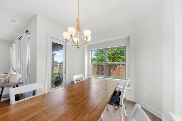 406 Garden Tree Trl, Midlothian, TX 76065 - dining room featuring a chandelier and wood finished floors