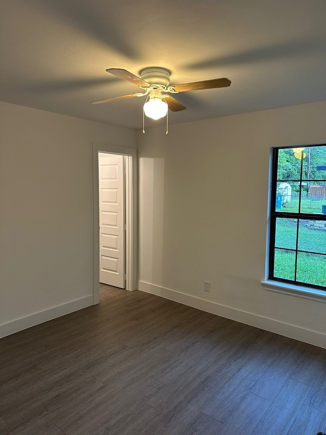 616 Leyenda Dr, Mesquite, TX 75149 - empty room with dark wood-type flooring and a ceiling fan