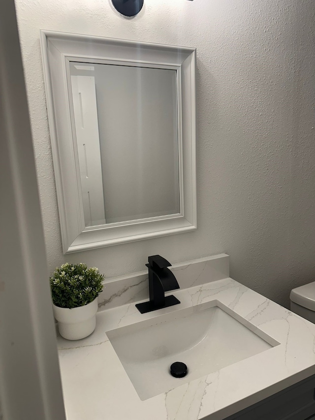 616 Leyenda Dr, Mesquite, TX 75149 - bathroom with vanity and a textured wall