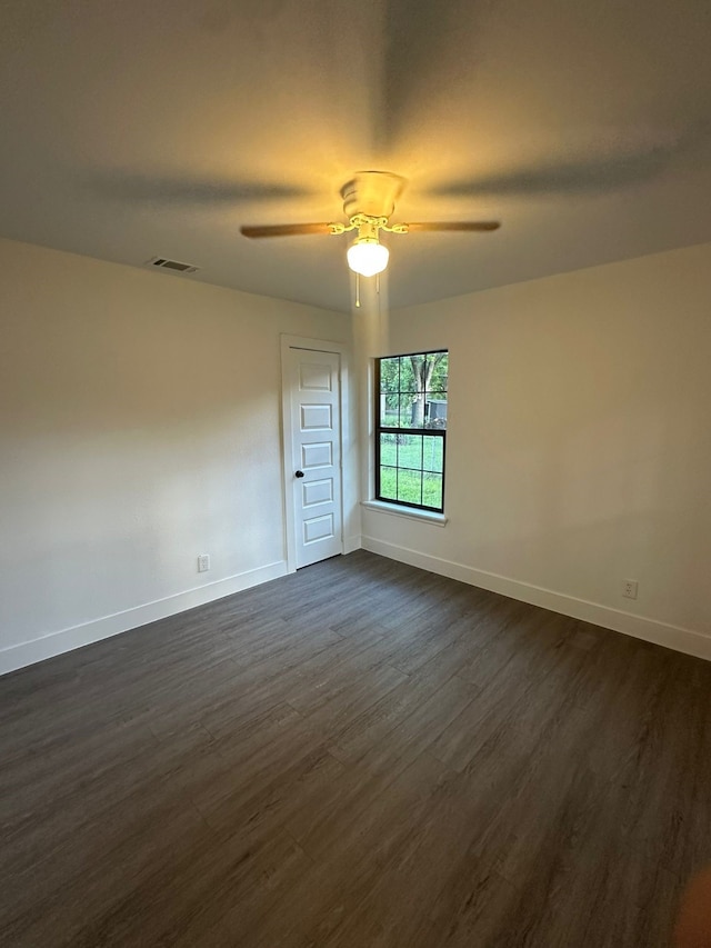 616 Leyenda Dr, Mesquite, TX 75149 - empty room featuring dark wood finished floors and a ceiling fan