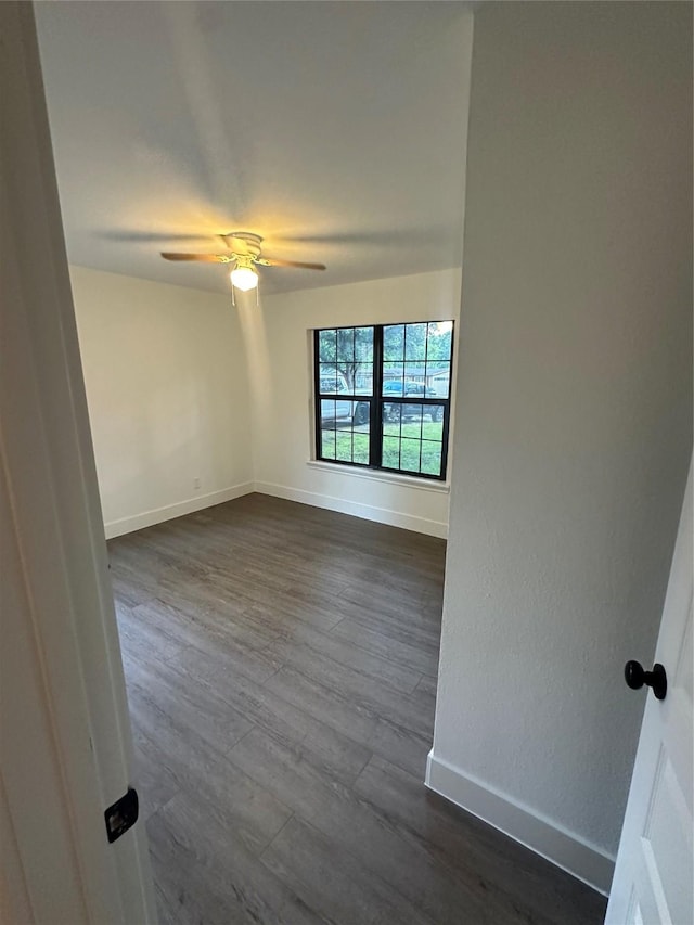 616 Leyenda Dr, Mesquite, TX 75149 - empty room with dark wood-style flooring and a ceiling fan