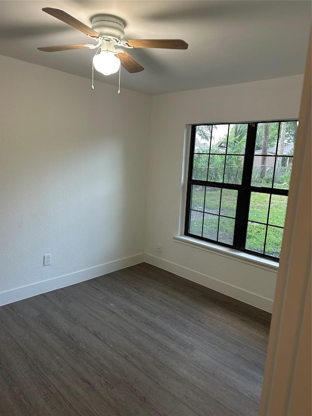 616 Leyenda Dr, Mesquite, TX 75149 - unfurnished room featuring dark wood-style flooring and a ceiling fan