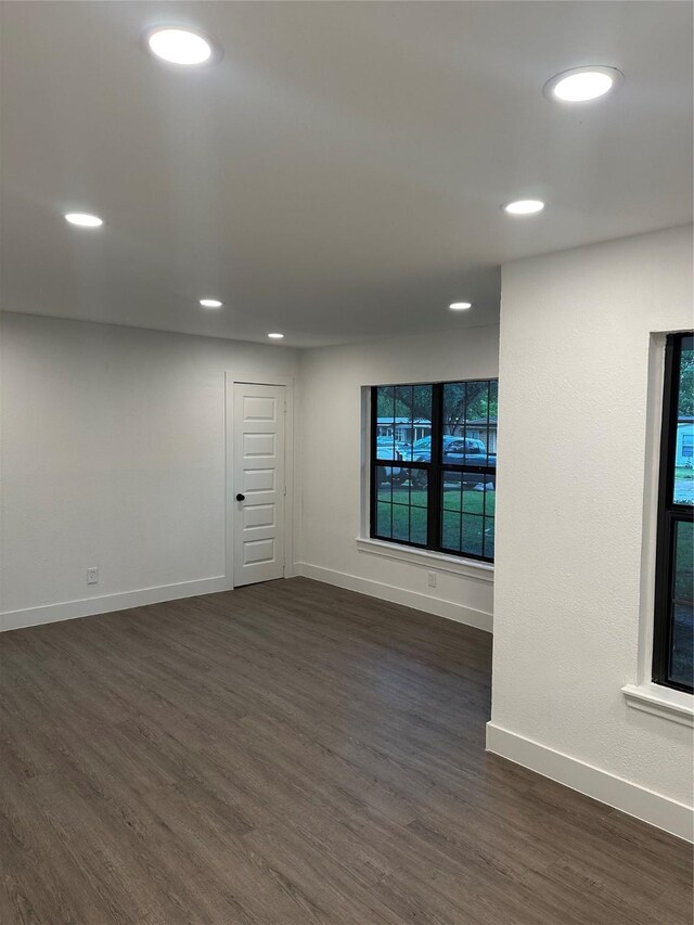 616 Leyenda Dr, Mesquite, TX 75149 - spare room with dark wood finished floors and recessed lighting