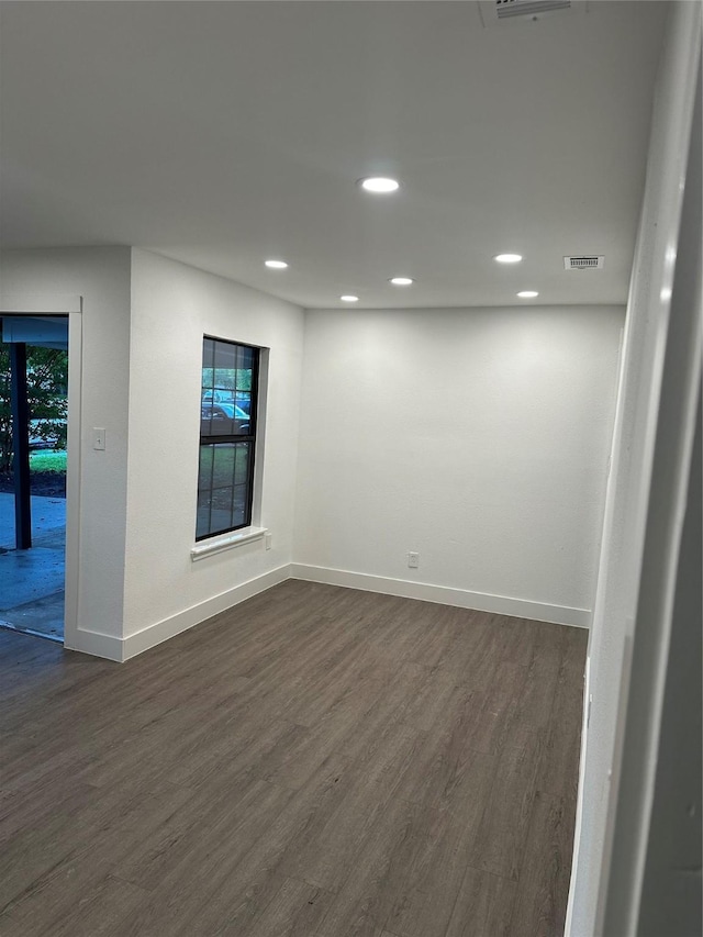 616 Leyenda Dr, Mesquite, TX 75149 - spare room with dark wood-style flooring and recessed lighting