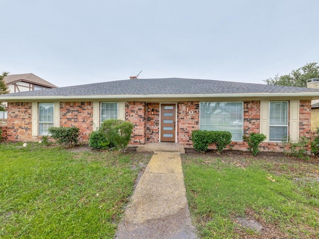 810 Serenade Ln, Richardson, TX 75081 - single story home with brick siding, a front lawn, roof with shingles, and a chimney