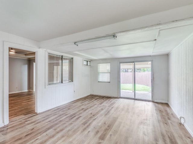 810 Serenade Ln, Richardson, TX 75081 - spare room with light wood-style flooring