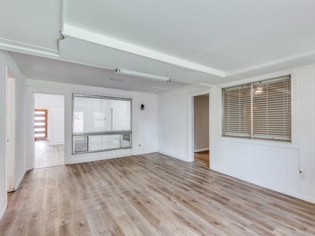 810 Serenade Ln, Richardson, TX 75081 - unfurnished room with wood finished floors and baseboards