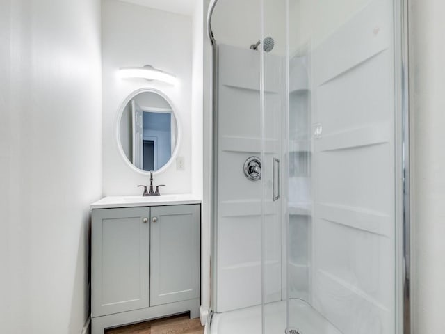 810 Serenade Ln, Richardson, TX 75081 - bathroom featuring a stall shower and vanity