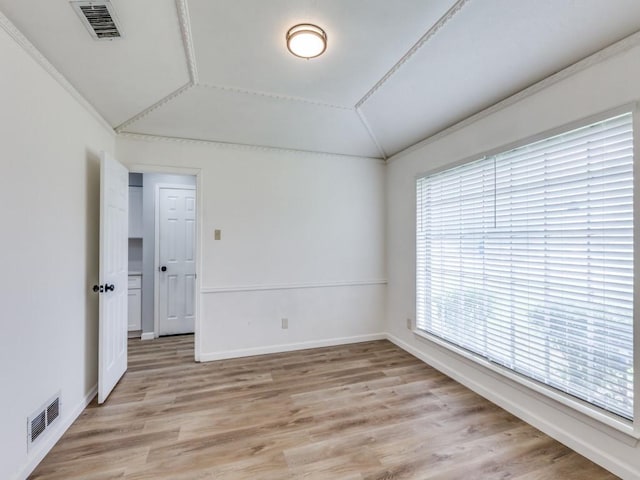 810 Serenade Ln, Richardson, TX 75081 - unfurnished room featuring lofted ceiling and light wood-style floors