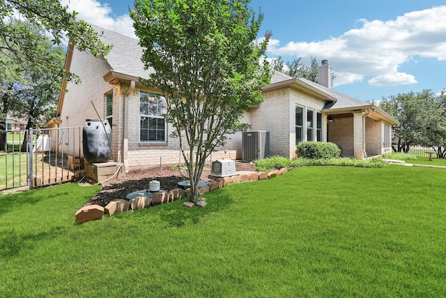 8502 Linden Ct, Granbury, TX 76049 - view of front of property with brick siding, a chimney, and roof with shingles