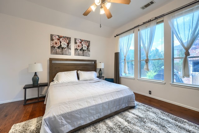 2860 Prado, Grand Prairie, TX 75054 - bedroom with multiple windows, wood finished floors, vaulted ceiling, and a ceiling fan