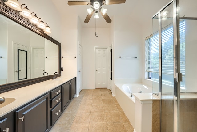 2860 Prado, Grand Prairie, TX 75054 - full bath with double vanity, a bath, a ceiling fan, and tile patterned floors