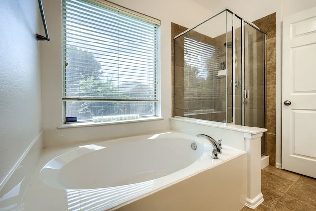 2860 Prado, Grand Prairie, TX 75054 - bathroom with a bath, a stall shower, and tile patterned floors
