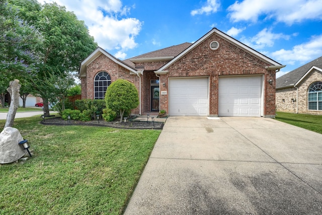 2860 Prado, Grand Prairie, TX 75054 - view of front of home featuring driveway, a garage, brick siding, and a front lawn
