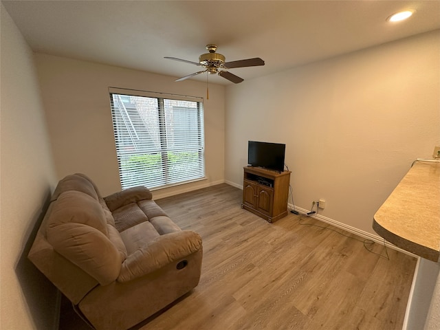 6036 Birchbrook Dr Unit 127, Dallas, TX 75206 - living room with light wood-type flooring, a ceiling fan, and recessed lighting