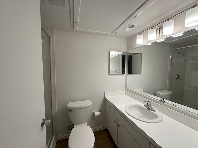 6036 Birchbrook Dr Unit 127, Dallas, TX 75206 - full bath featuring a shower stall, vanity, and wood finished floors