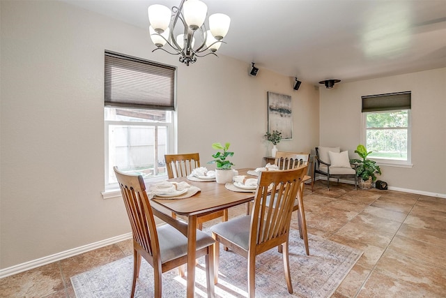 221 Sierra Dr, Joshua, TX 76058 - dining room featuring a chandelier and baseboards