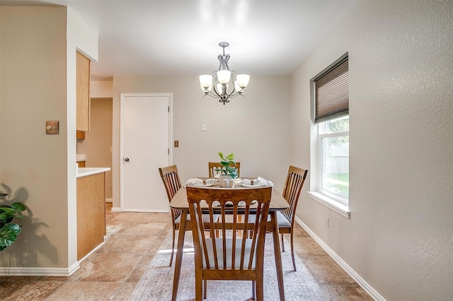 221 Sierra Dr, Joshua, TX 76058 - dining area with a chandelier and baseboards