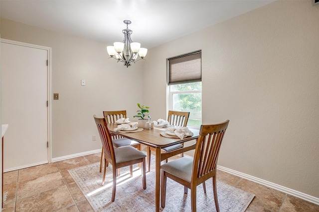 221 Sierra Dr, Joshua, TX 76058 - dining area with a chandelier and baseboards