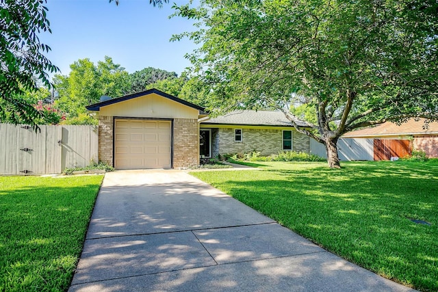 221 Sierra Dr, Joshua, TX 76058 - view of front facade with concrete driveway, brick siding, a gate, and an attached garage
