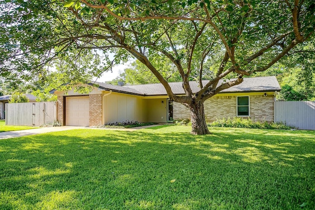 221 Sierra Dr, Joshua, TX 76058 - view of front of property featuring brick siding, an attached garage, and driveway