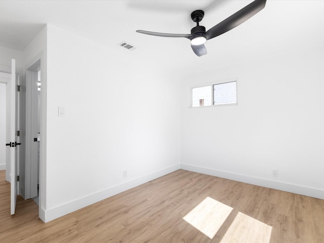 1910 Durham St, Irving, TX 75062 - spare room featuring wood finished floors and ceiling fan