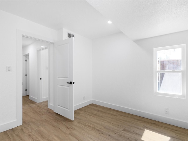 1910 Durham St, Irving, TX 75062 - bonus room featuring light wood-type flooring and recessed lighting