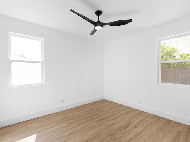 1910 Durham St, Irving, TX 75062 - spare room with light wood finished floors and ceiling fan