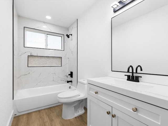 1910 Durham St, Irving, TX 75062 - bathroom with vanity, wood finished floors, and shower / washtub combination