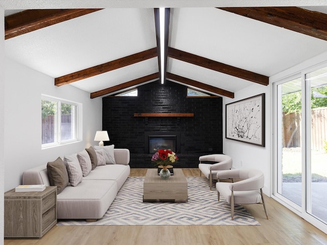 1910 Durham St, Irving, TX 75062 - living room with light wood-type flooring and a brick fireplace