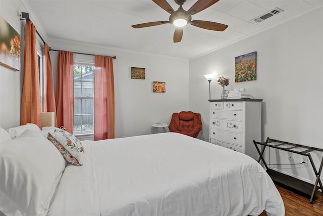 717 Thersa Dr, River Oaks, TX 76114 - bedroom featuring ornamental molding, wood finished floors, and ceiling fan