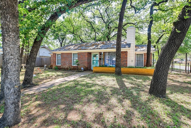 717 Thersa Dr, River Oaks, TX 76114 - single story home with brick siding and a chimney