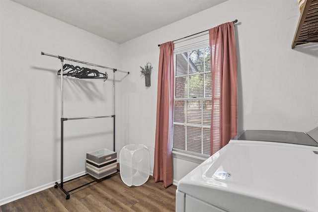 717 Thersa Dr, River Oaks, TX 76114 - laundry room featuring wood finished floors and baseboards